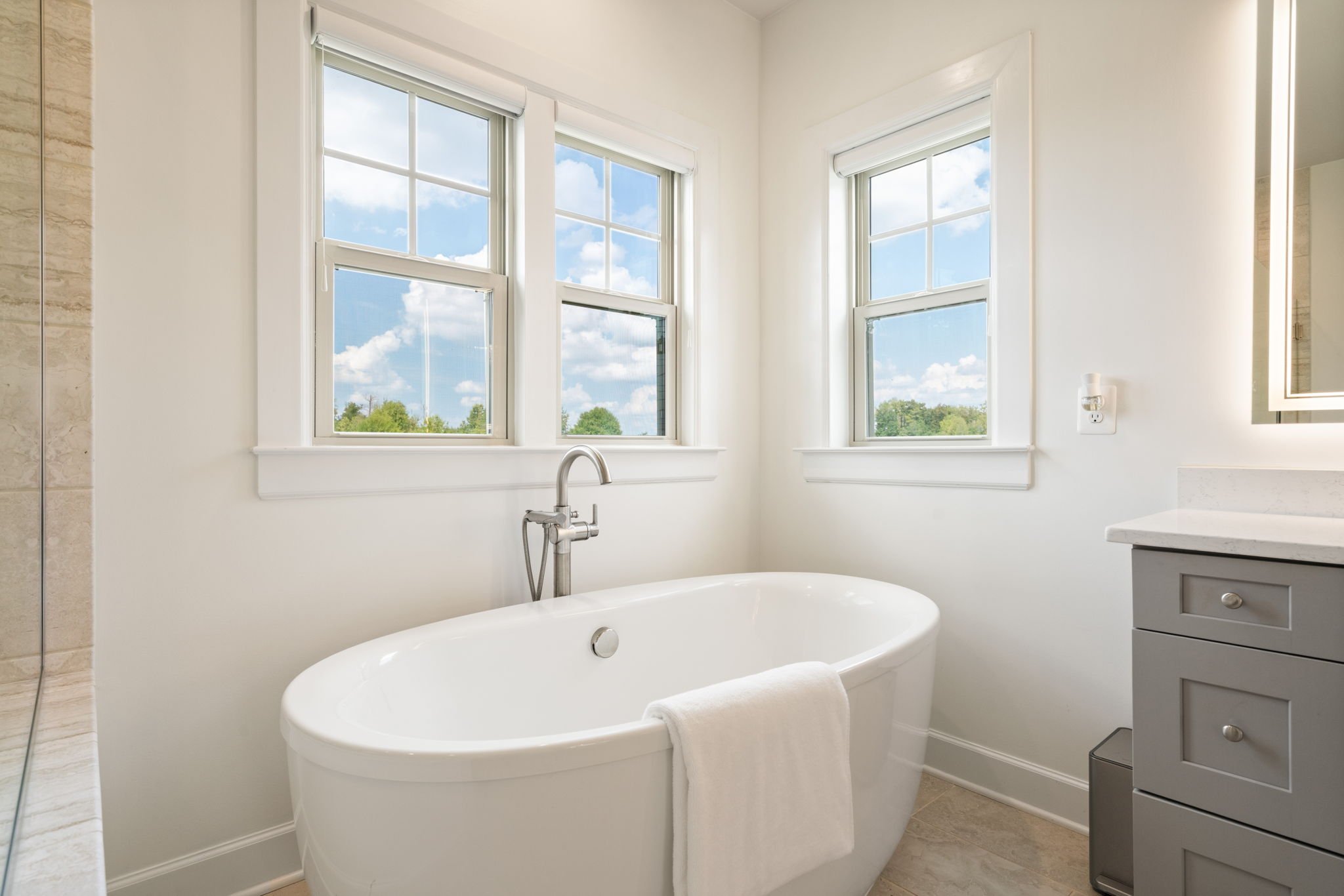 Primary bathroom with soaking tub, close angle