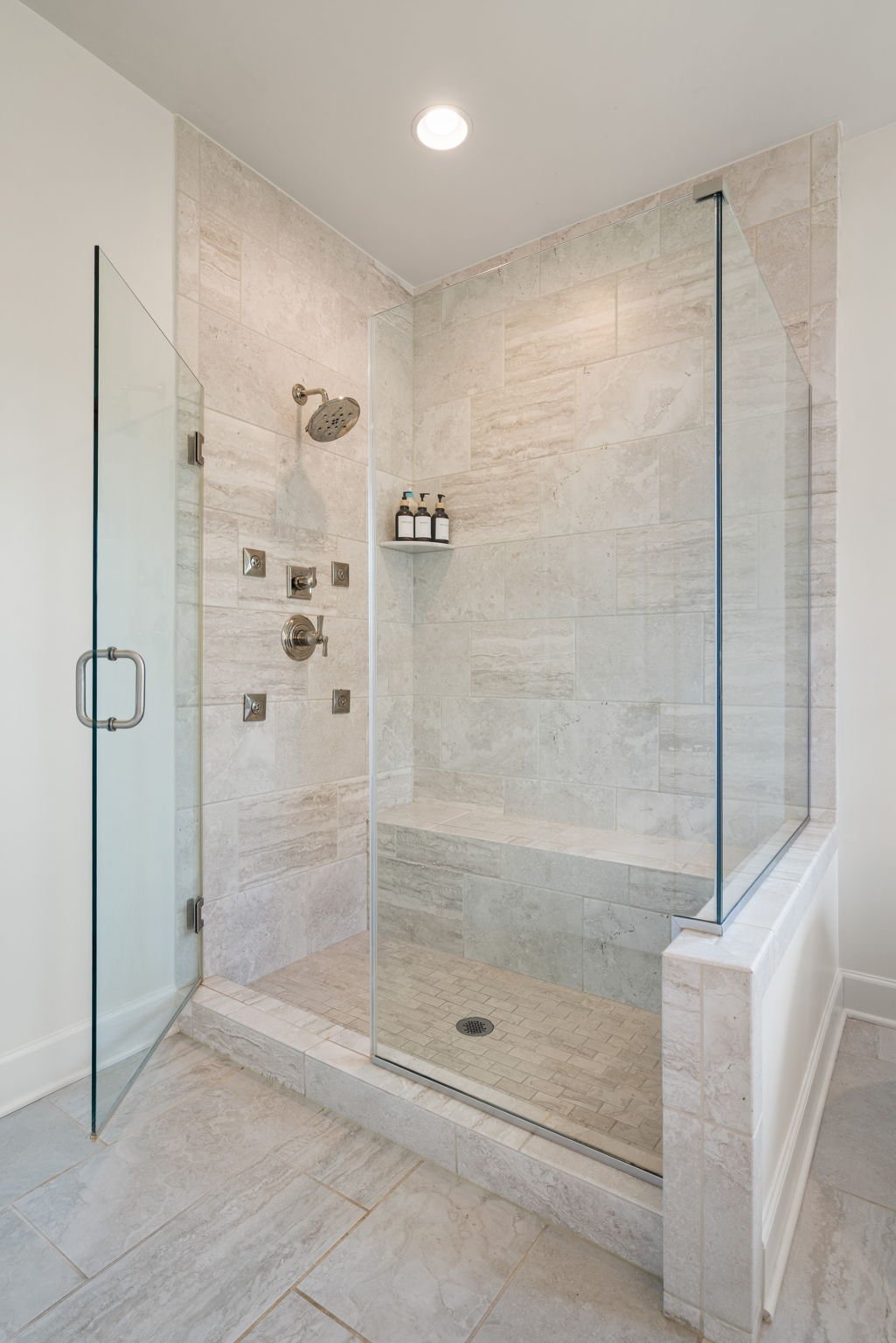 Glass-enclosed walk-in shower